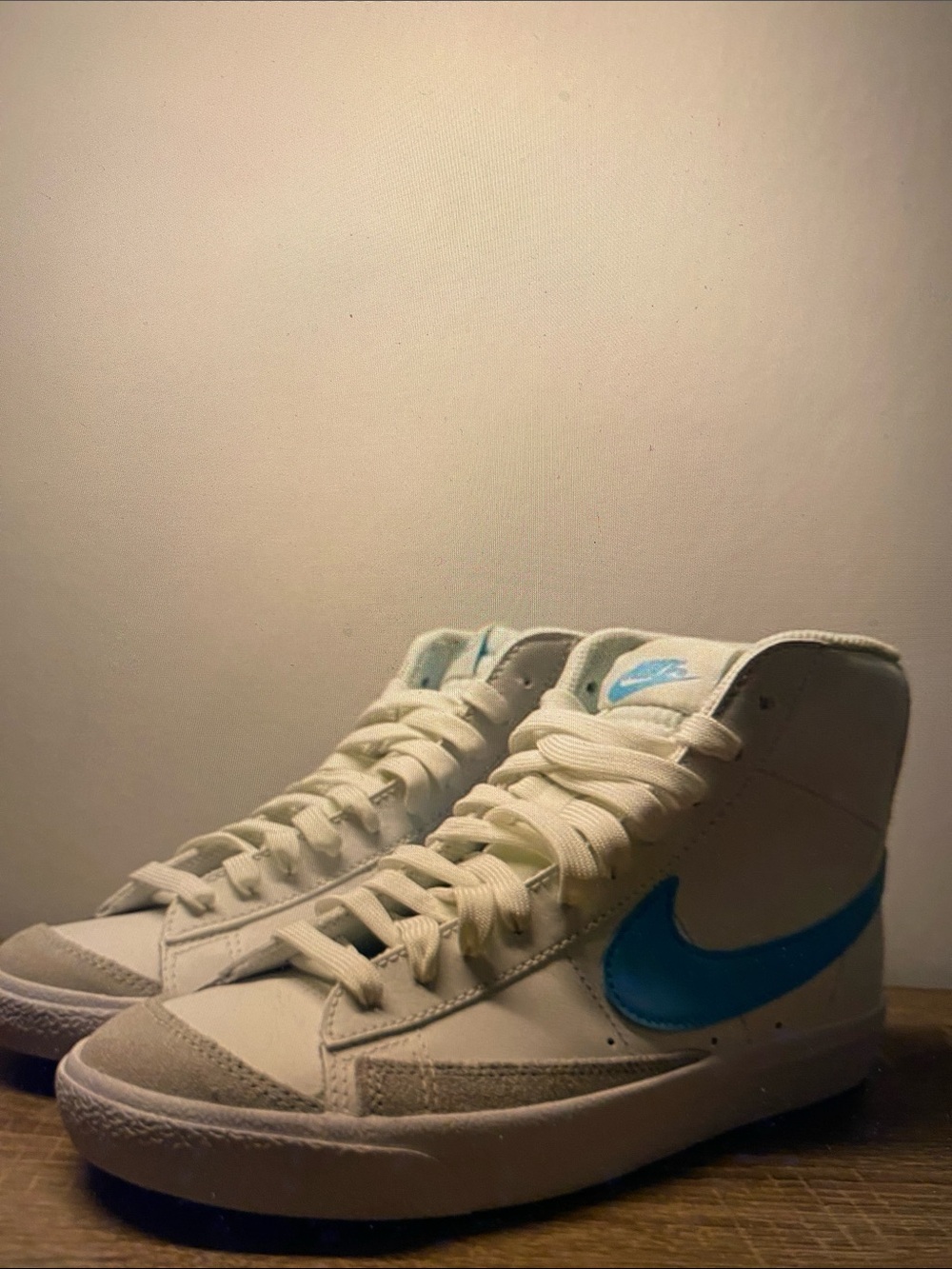 Nike Women’s High-Top Sneakers in White with Teal Swoosh